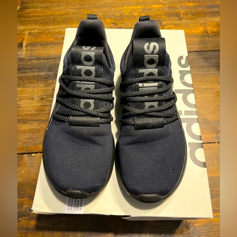 Adidas, tennis shoes, size 8, slide ons and color is black.